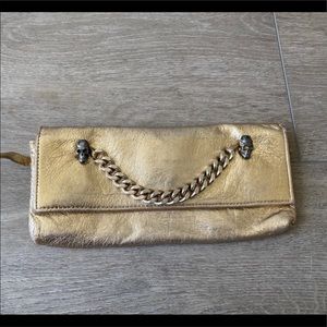 CC SKYE Gold Clutch With Chain and Skull Detail